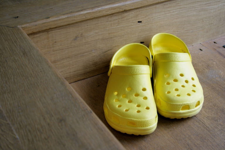 Crocs on wooden floor