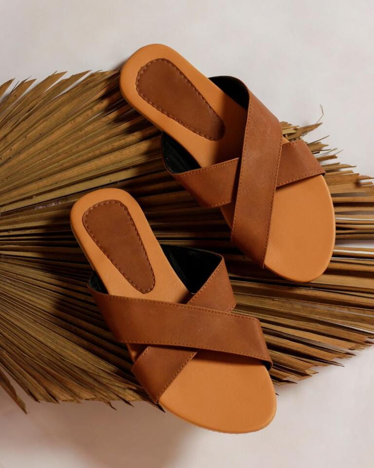 Women's sandals are a blend of light and dark brown with a simple elegant design. Comfortable sandals for everyday use. Sandals without haihil.