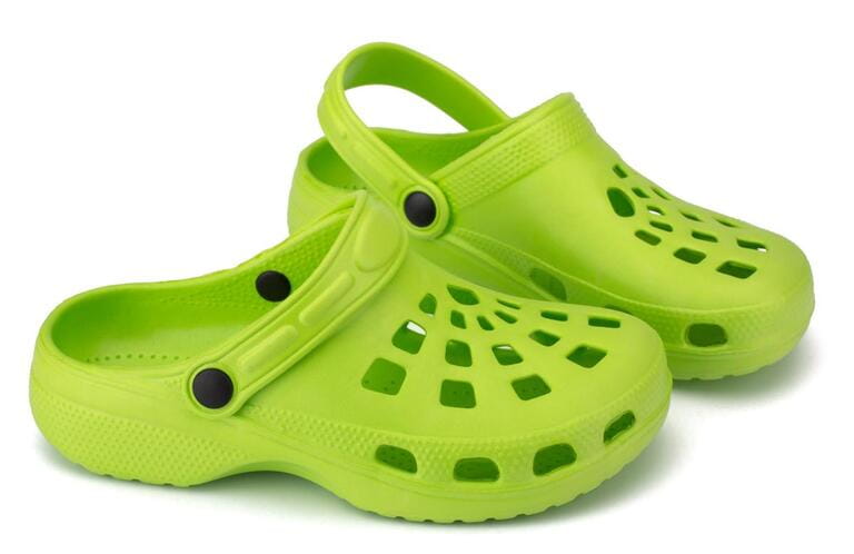 Children's rubber sandals isolated on the white background